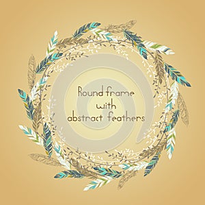 Beautiful round frame with feathers and some floral elements.