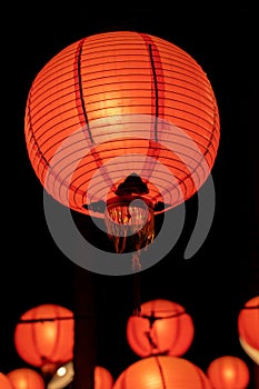 Beautiful round red lantern hanging on old traditional street, concept of Chinese lunar new year festival in Taiwan, close up. The