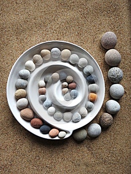 Beautiful round stones on sea sand, Lithuania