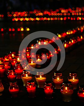 Beautiful row of red funeral candles