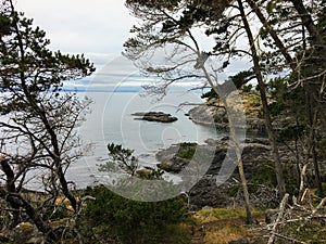 The beautiful rugged coastline of the famous east sooke coast trail along the rocky shores of southern Vancouver island