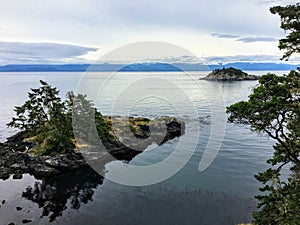 The beautiful rugged coastline of the famous east sooke coast trail along the rocky shores of southern Vancouver island