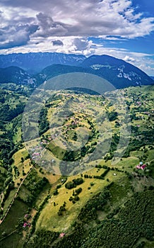 Beautiful rural area between the Piatra Craiului and Bucegi mountains, Magura, Pestera, Moieciu, Transylvania, Romania as seen fro