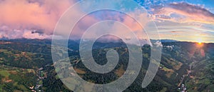 Beautiful rural area at sunset in the Apuseni mountains, Transylvania, Romania as seen from above with a drone. Aerial shot