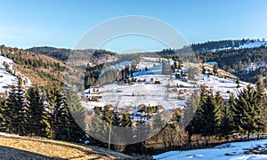 Beautiful rural landscape against the backdrop of the Carpathian Mountains in early spring