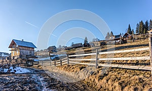 Beautiful rural landscape against the backdrop of the Carpathian Mountains in early spring