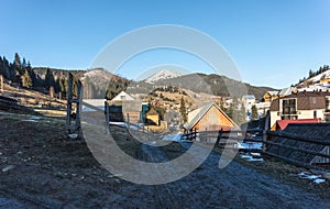 Beautiful rural landscape against the backdrop of the Carpathian Mountains in early spring