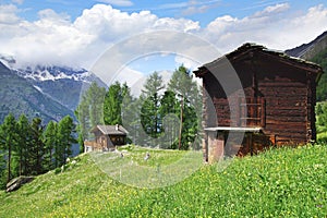 The beautiful rural landscape with chalet near Tasch.