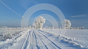 Beautiful rural landscape of Lithuania . Snowy road