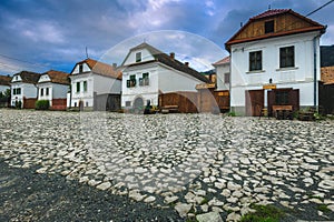 Beautiful rural whitewashed houses in row, Rimetea, Transylvania, Romania