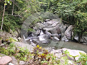 Beautiful rushing water in a stony waterfall