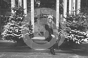 Beautiful russian girl walking in Tverskaya Square in Christmas time