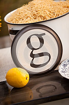 Rustic table setting with lettered plate.