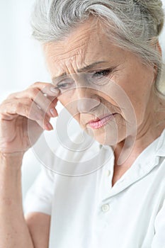 Beautiful sad elderly woman