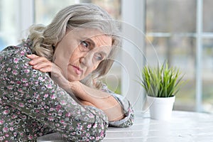 Beautiful sad elderly woman