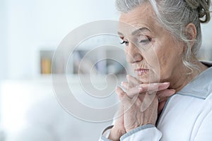 Beautiful sad elderly woman