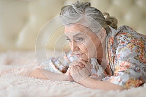 Beautiful sad elderly woman close-up