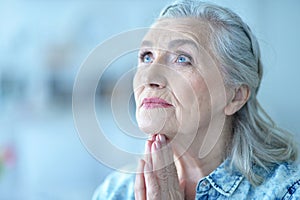 Beautiful sad elderly woman