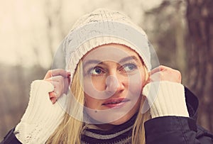 Beautiful sad girl in a hat. Toned