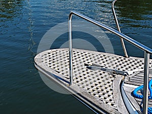 Beautiful sail boat yacht wooden bow on sea ocean water background