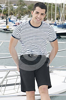 Beautiful sailorman in a yatch