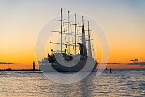 Beautiful sailship going to sunset