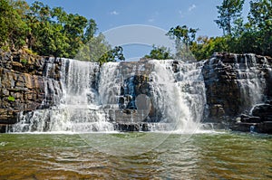 Beautiful Sala water falls near Labe with trees, green pool and a lot of water flow, Guinea Conakry, West Africa