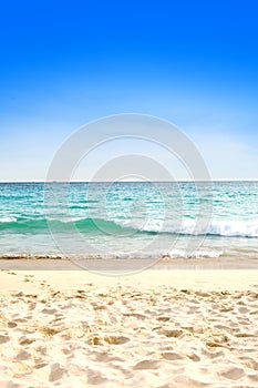 Beautiful sandy beach against blue sky