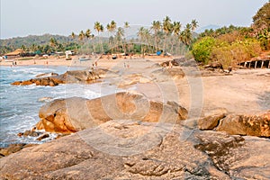 Beautiful sandy beach with palm trees. Calmness of South India, Goa area