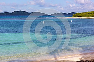 Beautiful sandy beach with spectacular views on other small islands at St. Thomas, USVI.