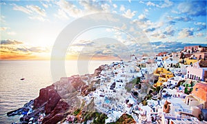 Beautiful Santorini island landscape with sea, sky and clouds. Oia town, Greece landmark photo