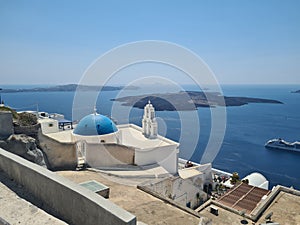 Beautiful Santorini island landscape with sea, sky and clouds. Oia town, Greece landmark