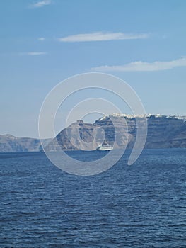 Beautiful Santorini island landscape with sea, sky and clouds. Oia town, Greece landmark