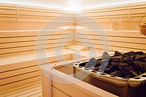 Beautiful sauna interior with stones