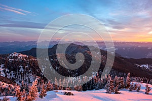 Beautiful scenary of Fagaras Mountains during sunrise, seen from Mount Cozia photo