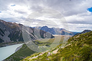 Beautiful scene green nature and rocky mountain with glacier over the Mt Cook National park (Muller hut track) I