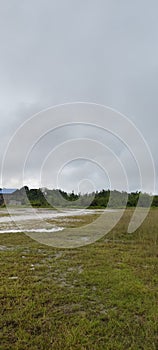 beautiful scene of pitch with cloudy sky