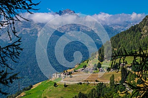 Beautiful scene of rocky forested mountains in Val Aoste, Italy