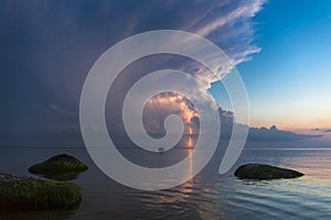 Beautiful scene with stormfront and lightning summer seascape.