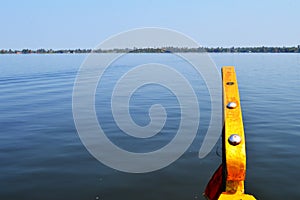 Beautiful scenery of backwaters with the bow of a shikara in view