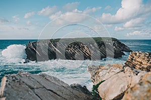 Beautiful scenery of Baleal islands in Peniche, Portugal under the fluffy clouds