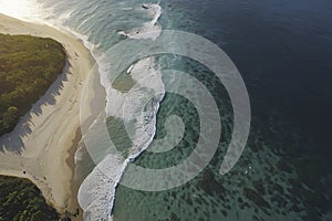 Beautiful scenery of beach, ocean, wave, and island. Beach and island illustration.