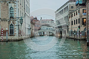 Beautiful scenery of the canal and endless streets of Venice photo