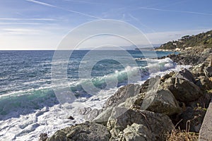 Beautiful scenery of crazy sea waves splashing in Varazze, Italy