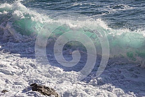 Beautiful scenery of crazy sea waves splashing in Varazze, Italy