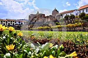 Beautiful scenery of a garden in front of the Qorikancha Cusco in Peru