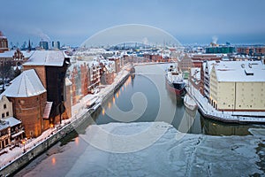 Beautiful scenery of Gdansk over Motlawa river at snowy winter, Poland