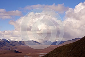 Beautiful scenery of hills under the cloudy sky in the Gates of the Arctic National Park