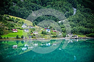 Beautiful scenery of houses on hillside of Lustrafjorden fjord in Norway