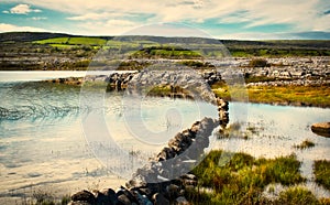 Beautiful scenery of irish green hills and lake at Burren National Park in Ireland